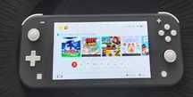 Konsola Nintendo Switch Lite + etui + 3 gry - stan bardzo dobry