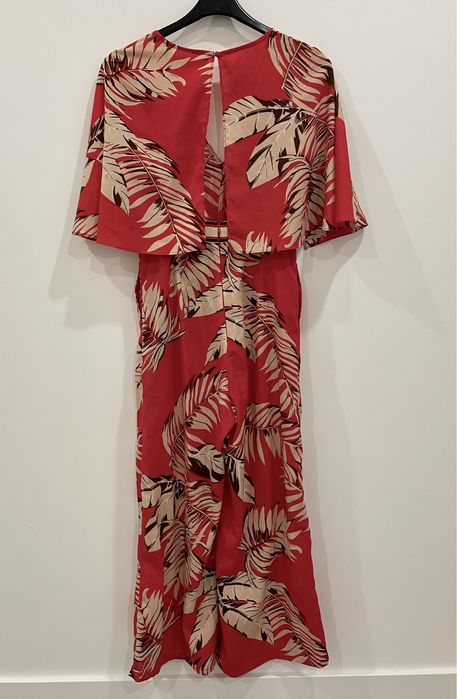 Macacão vermelho com padrão de folhas (MLD, tamanho S)