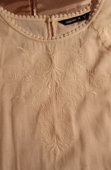 Blusa tipo linho creme manga comprida