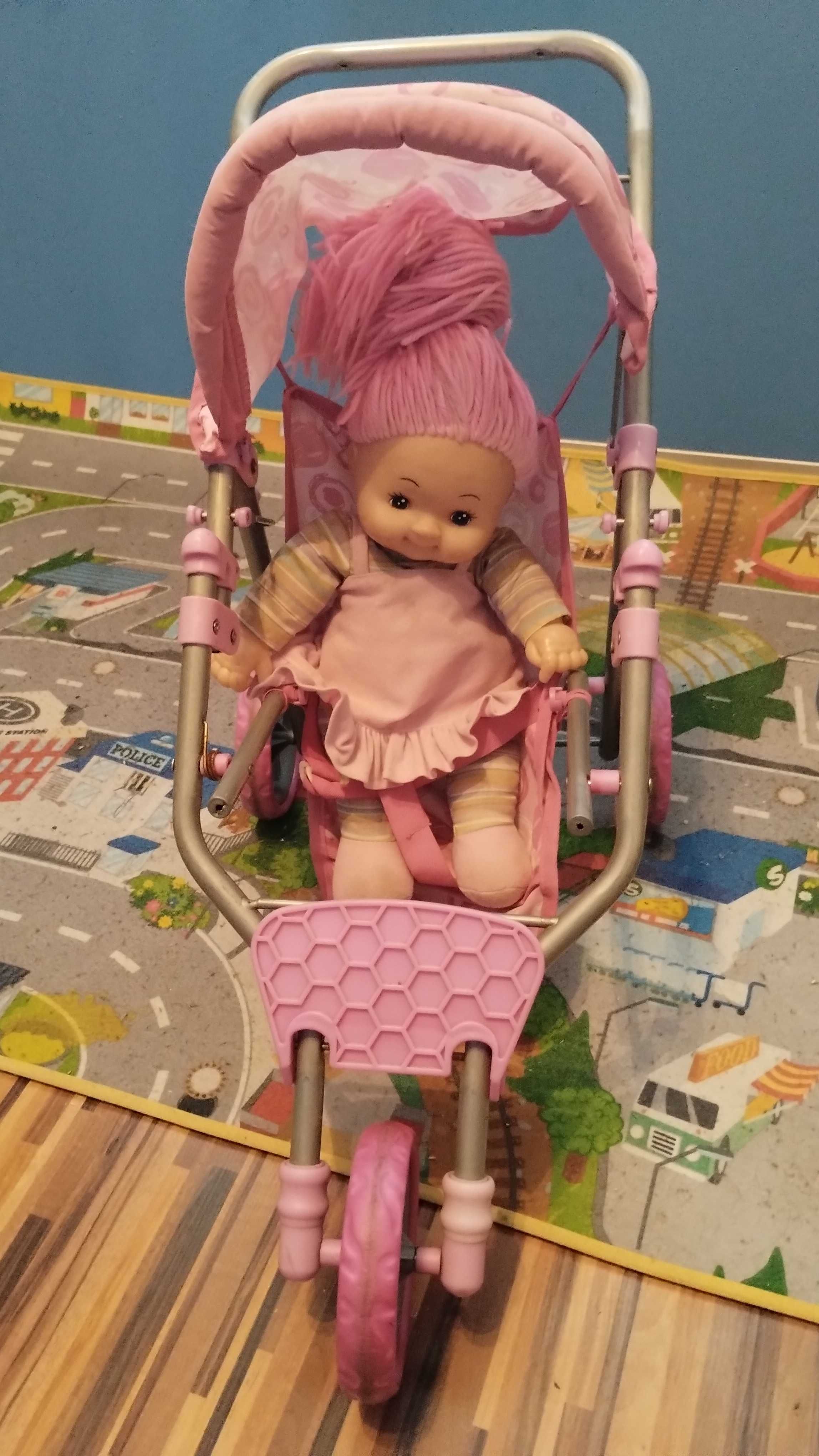 Wózek dla lalek z lalką