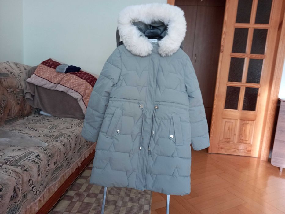 Жіноча пухова куртка