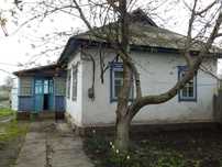 Продам свій будинок з великим участком,