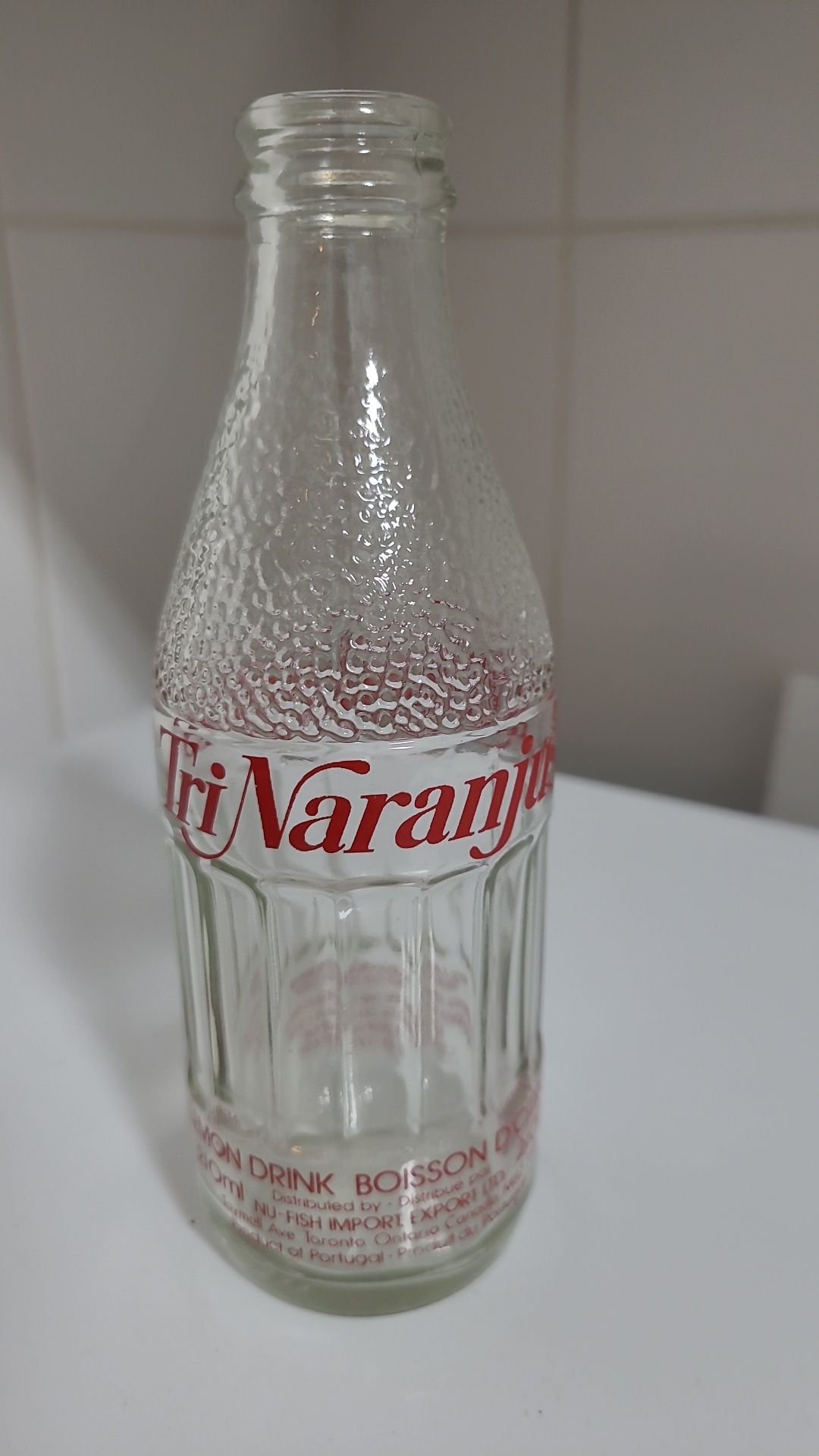 Garrafa pirogravada da marca Tri Naranjus