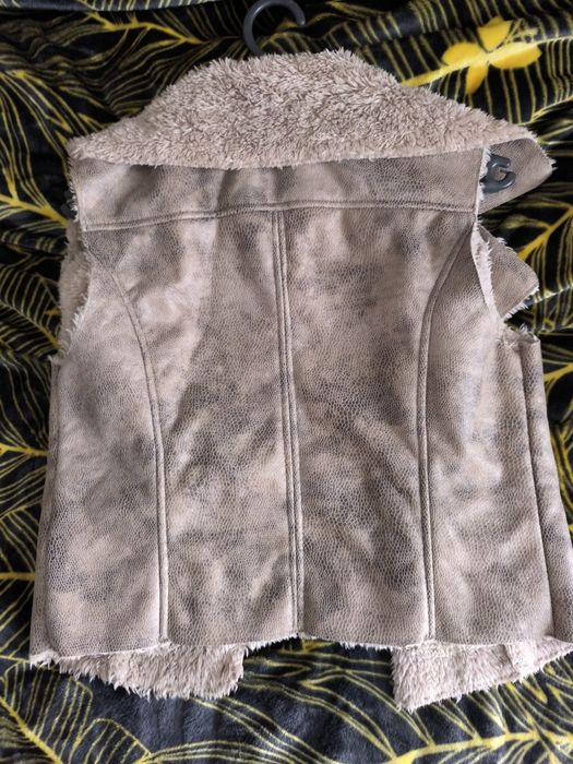 Kamizelka połyskujaca z ociepleniem