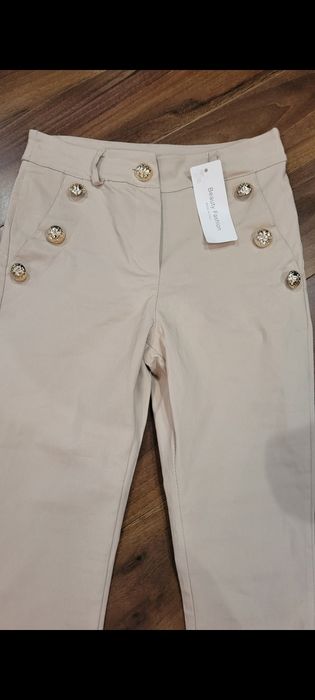 Spodnie beżowe Beauty Fashion roz S złote guziki nowe