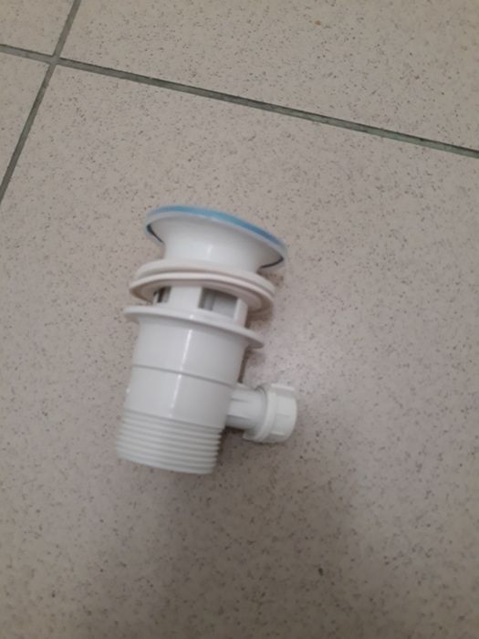 Korek do umywalki z przelewem