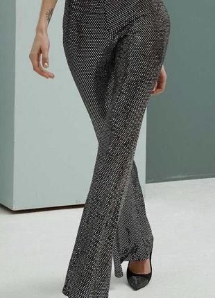 Брюки кльош з паєтками