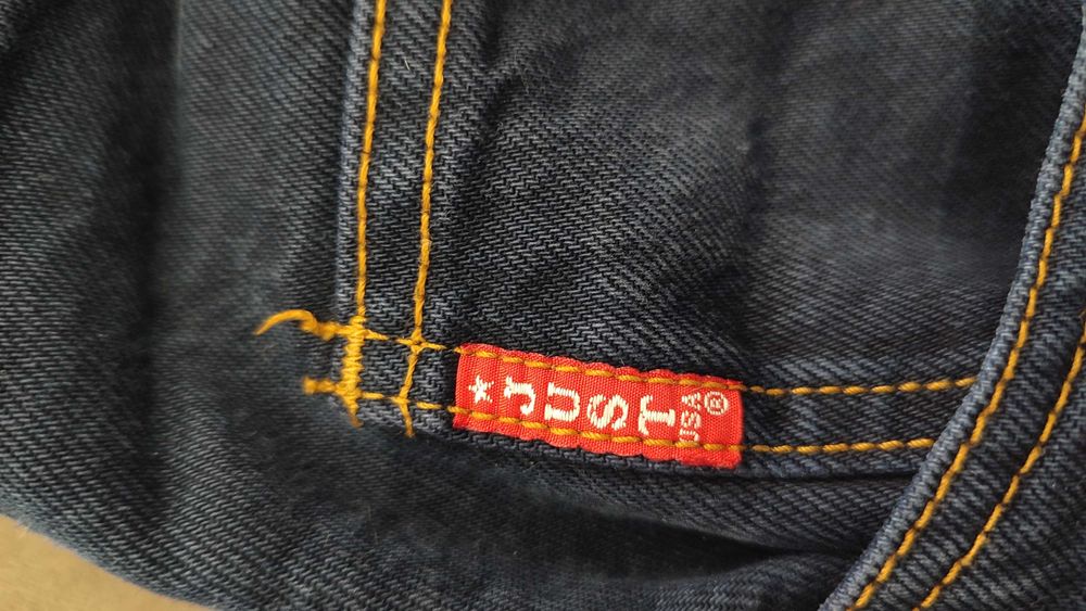 Темно-сині жіночі джинси