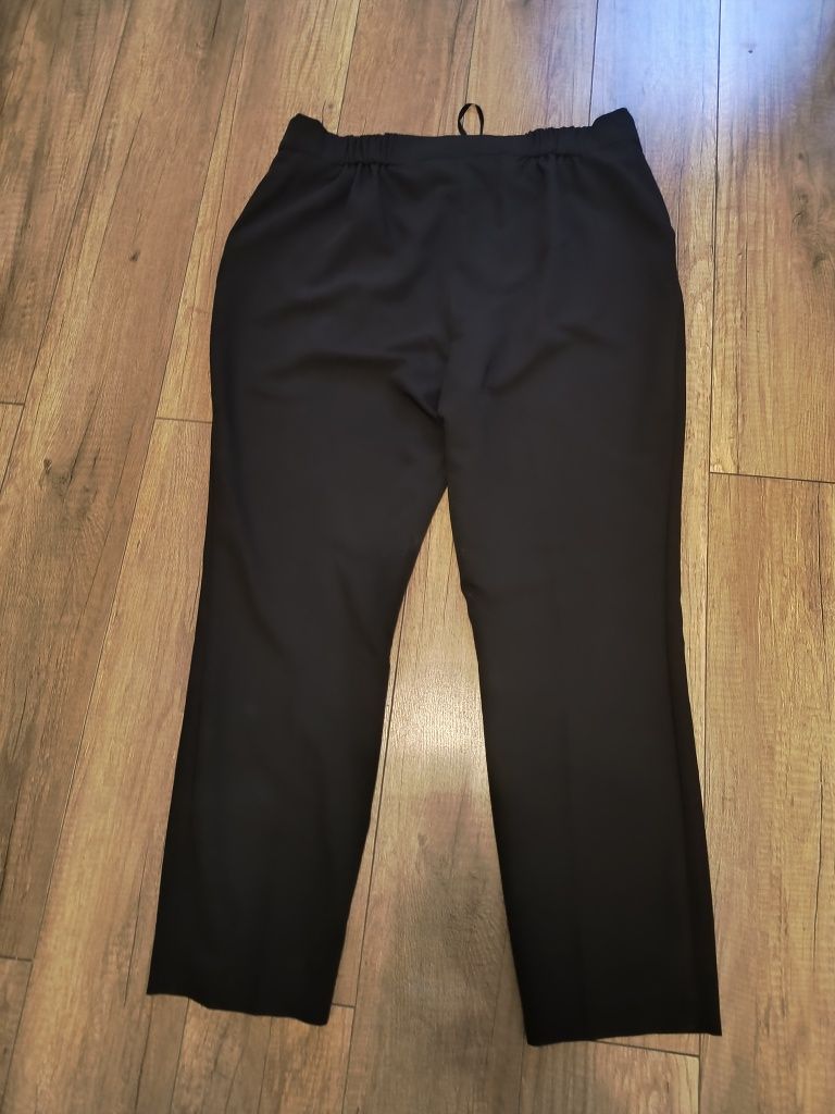 czarne eleganckie spodnie rozmiar 46.
Szer w pasie 48 cm x2  rozciąga