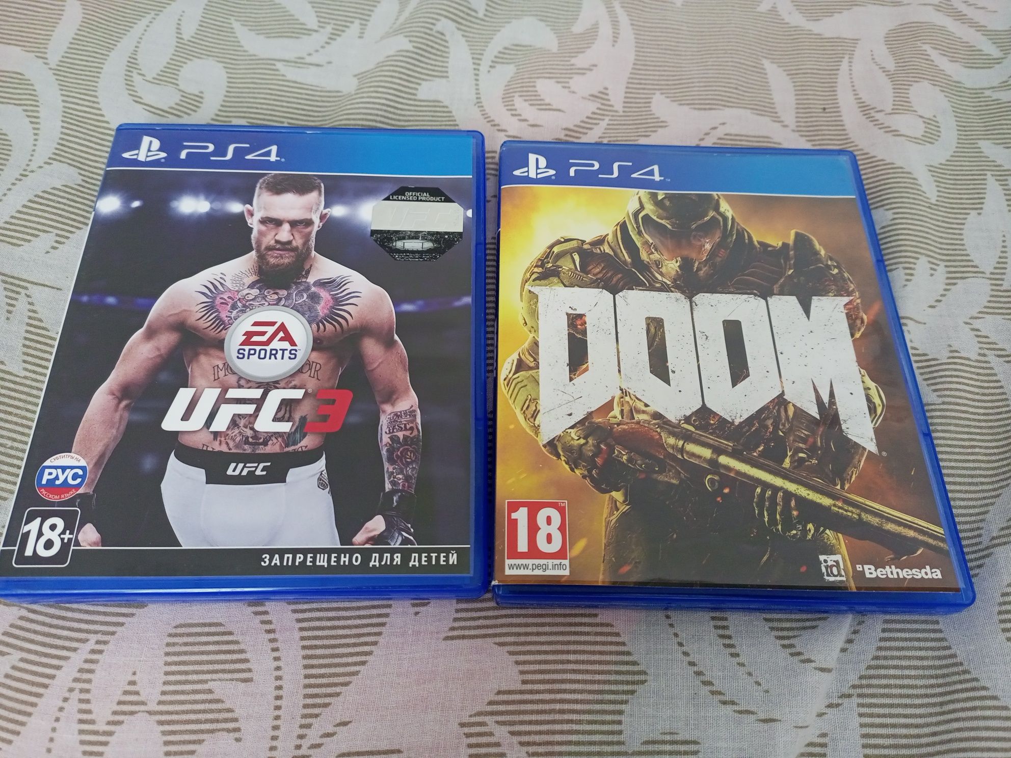 Ігри на пс4 Ufc3 і Doom