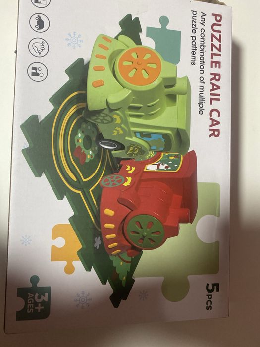 Новорічний потяг і пазл килимок