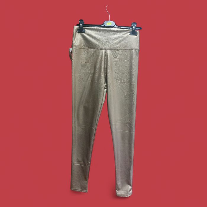 Damskie spodnie złote z ecoskóry