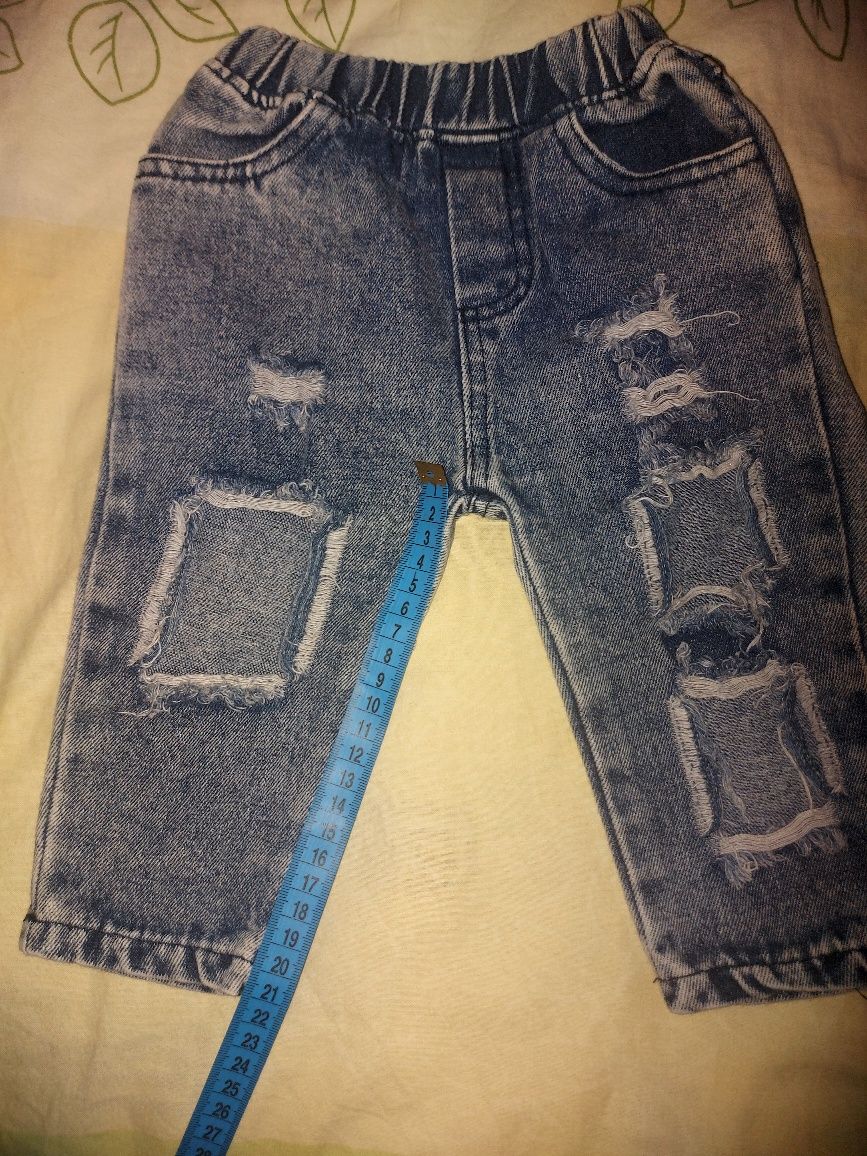 Рваные джинсы 74