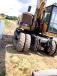 Koparka CAT kołowa M315, 2002r