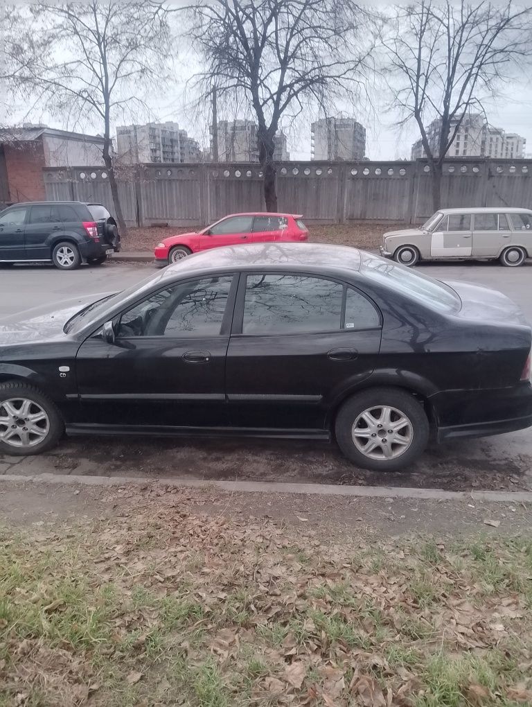 Шевроле Еванда 2.0