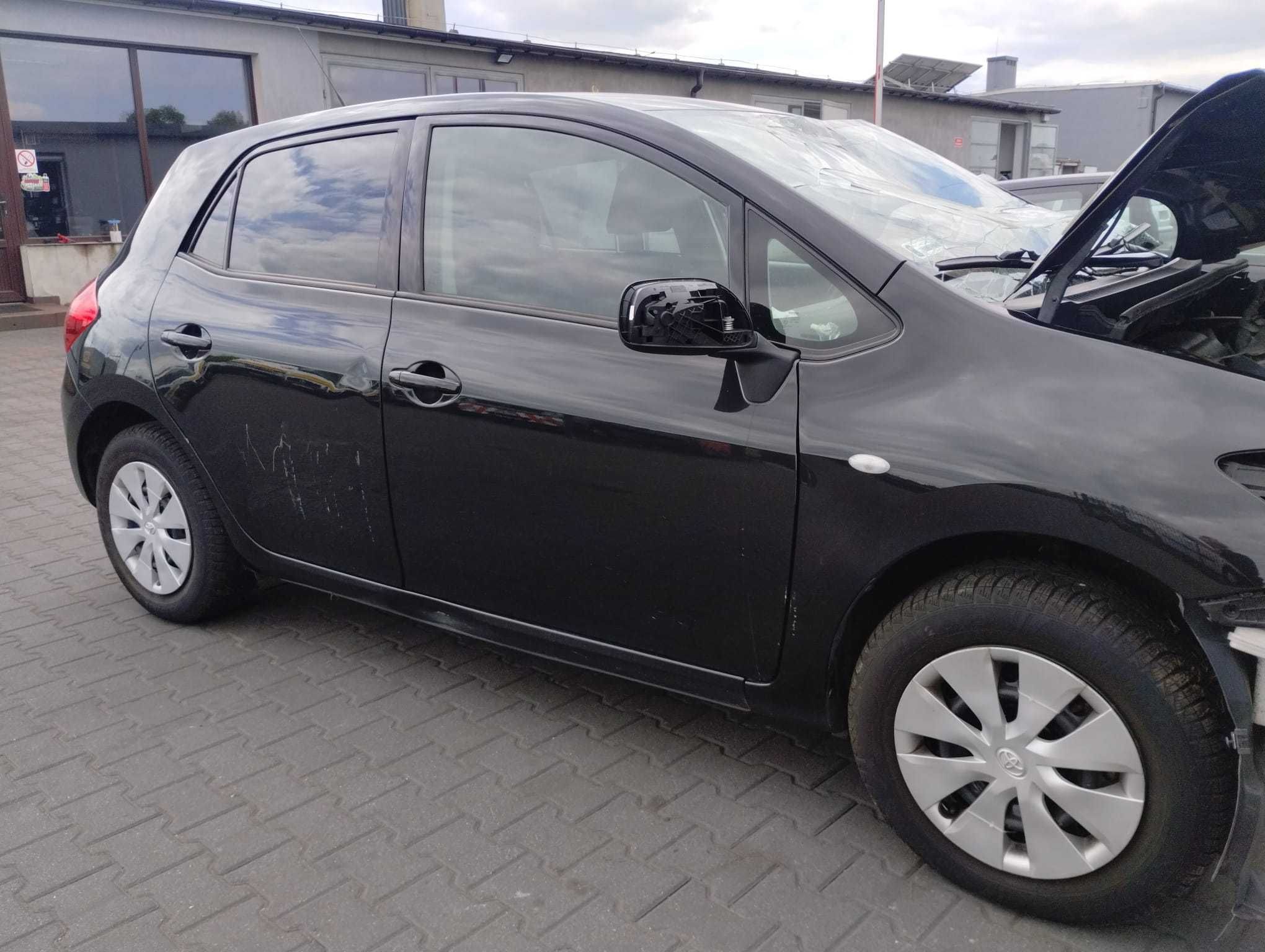 Drzwi przód przednie prawe Toyota Auris I E15 06-09 lakir 206 5d