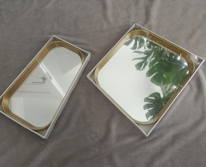 Lustra w złotej ramie