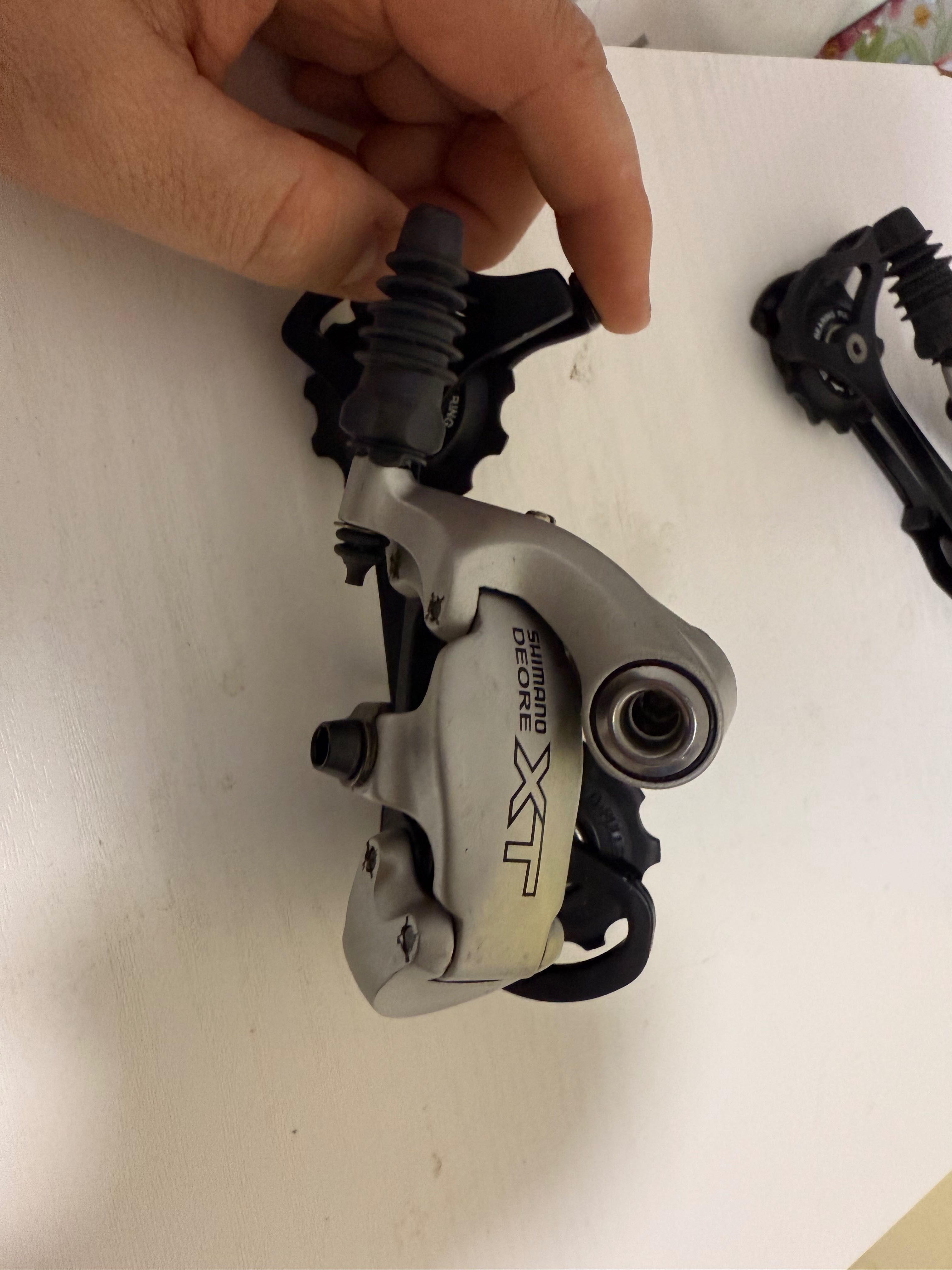 Задній перемикач Shimano Deore XT M750 9 швидкостей