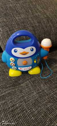 Muzyczny pingwin zabawka karaoke z mikrofonem.