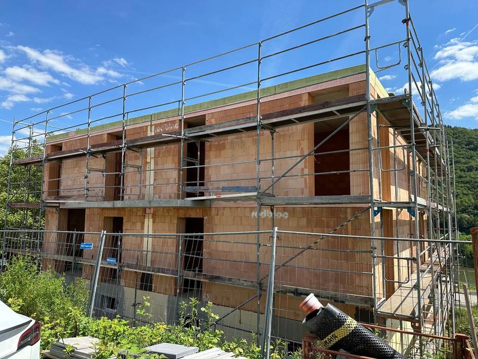 Будівництво будинків під ключ | DOMiQ