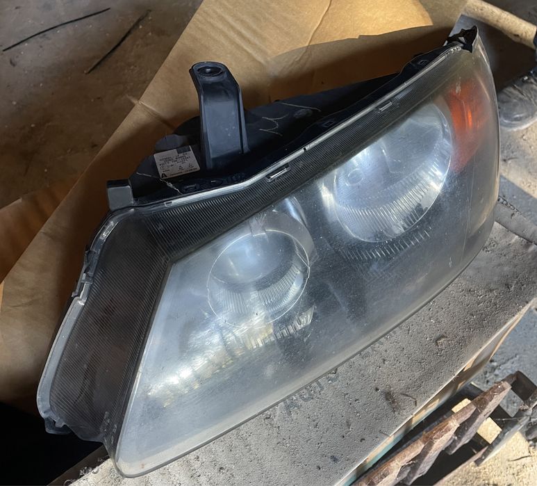 Farol Nissan Almera