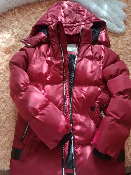 Зимова суперова подовжена куточка на хлопчика так і на дівчинку.