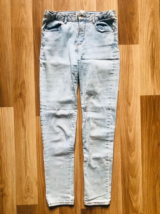Spodnie jeansy dziewczęce firmy Zara. Niebieski jasny.
