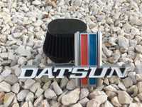 Datsun 620 emblema