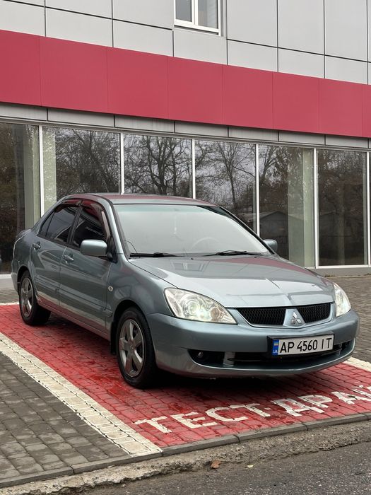 Продам лансер 9 автомат газ/бензин рестайлинг