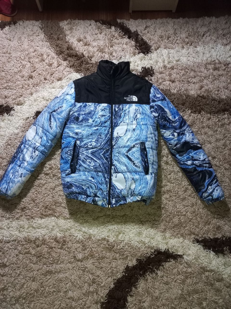 Пуховик від The north face