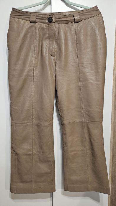 Beżowe spodnie Ochnik skórzane skóra