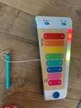 Magiczny dotykowy ksylofon Hape Baby Einstein Cymbałki