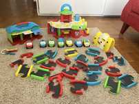 Pista Imaginarium com garagem e 7 carrinhos