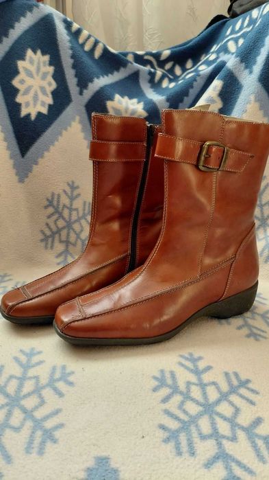 Теплі шкіряні чоботи на хутрі