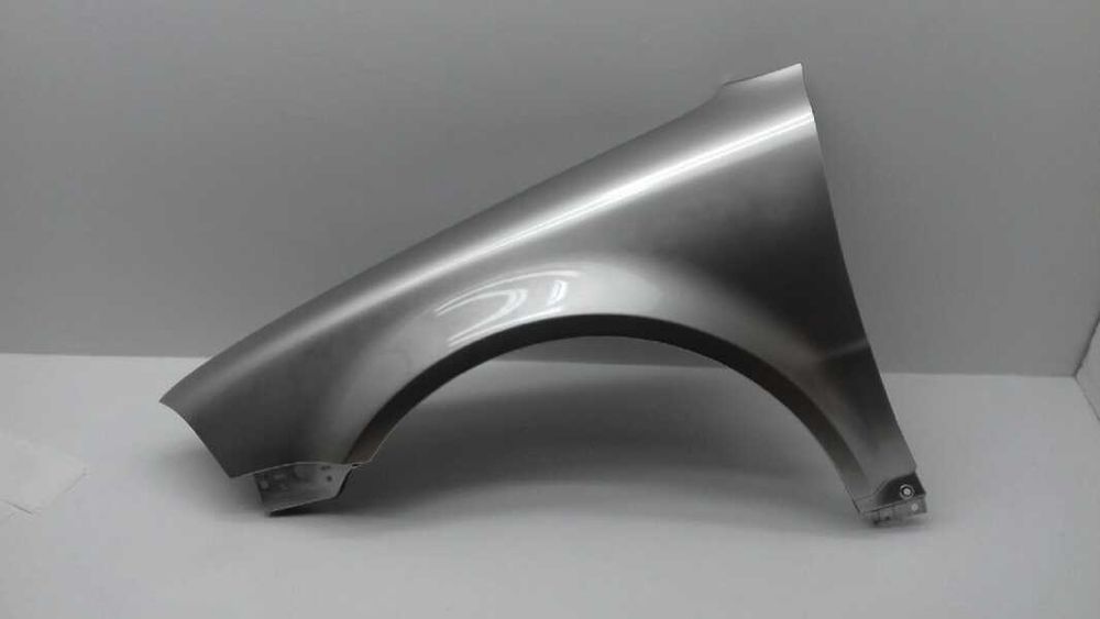 Błotnik lewy VW PASSAT B5 LIFT bez otworu na kierunek WSZYSTKIE kolory