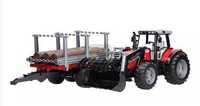 Traktor Massey Ferguson 7480 z ładowaczem czołowym i przyczepą