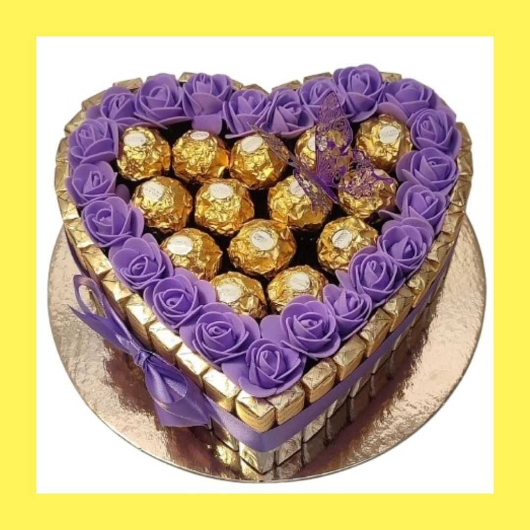Prezent na 35 Urodziny. Tort ze słodyczy Ferrero, Merci, róże. Serce.