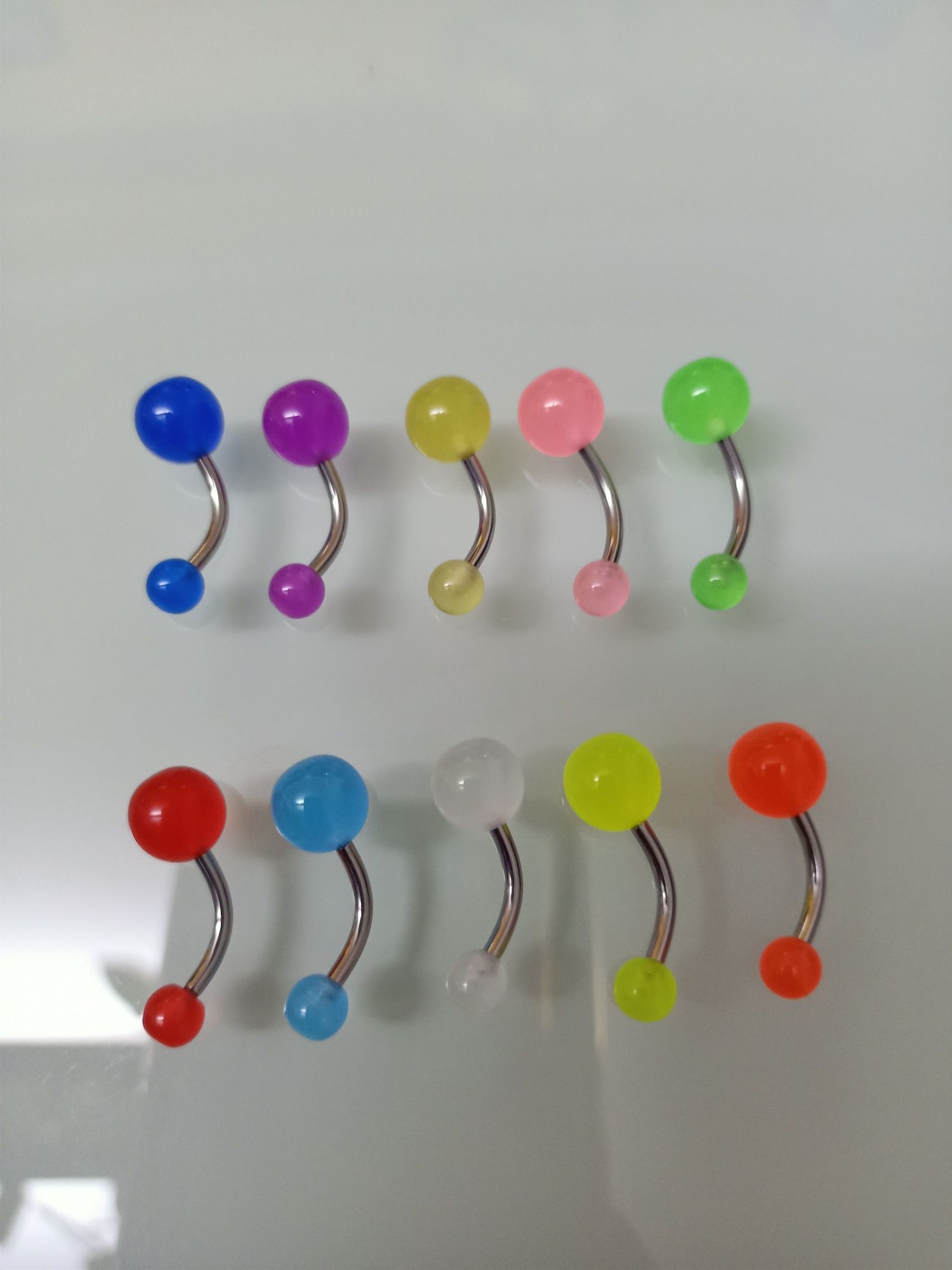 Piercing  umbigo fluorescente