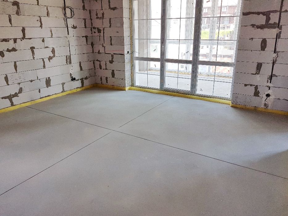 Стяжка пола машинним методом.  Полусуха Стяжка за 1 день. Із фіброю
