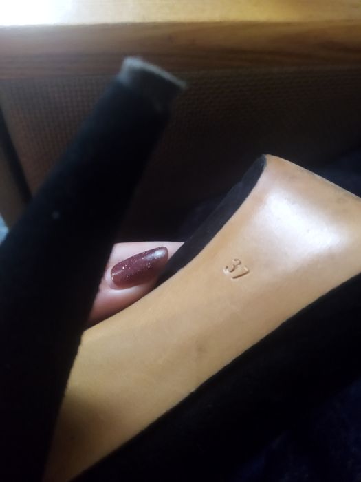 Туфли на высоком каблуке.