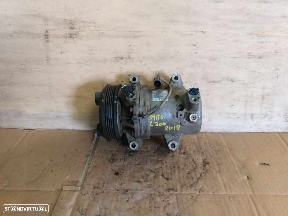 Compressor ar condicionado mitsubishi l200 / strakar  - a673