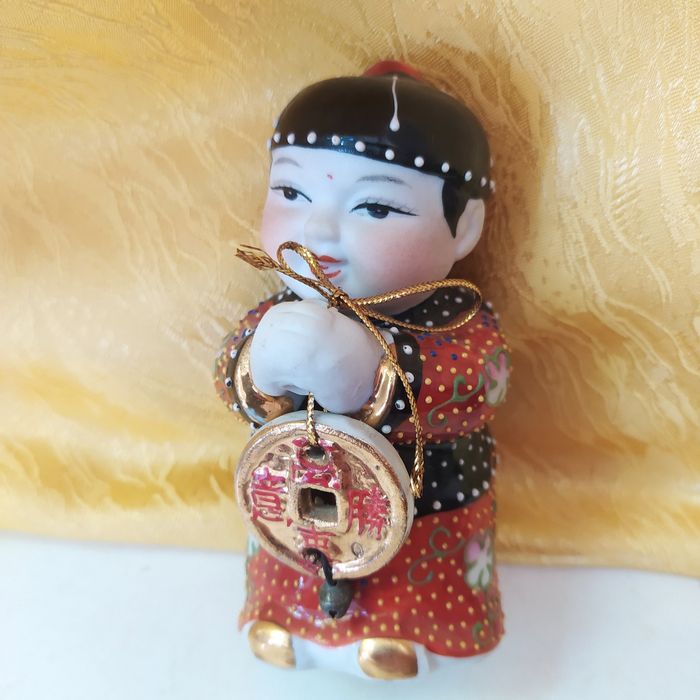 Продам статуетку китайця