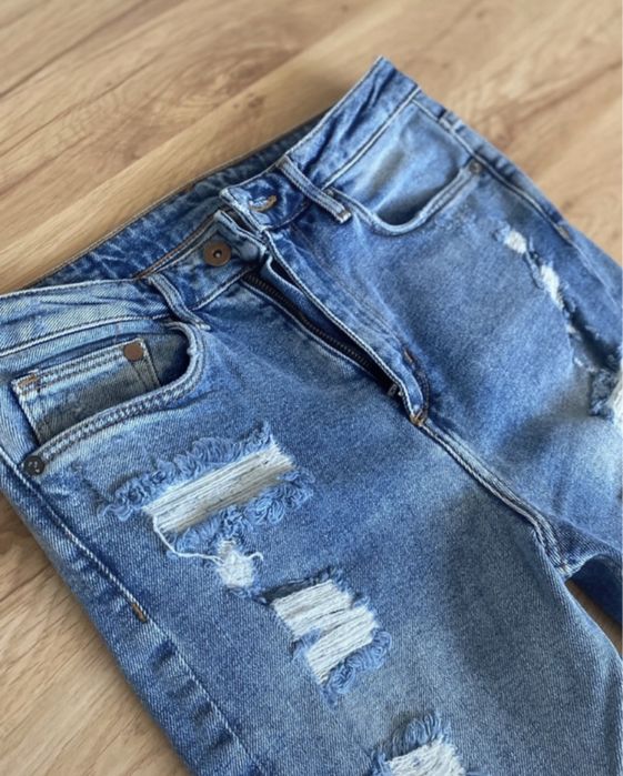 Jeansy spodnie z dziurami h&m z wysokim stanem