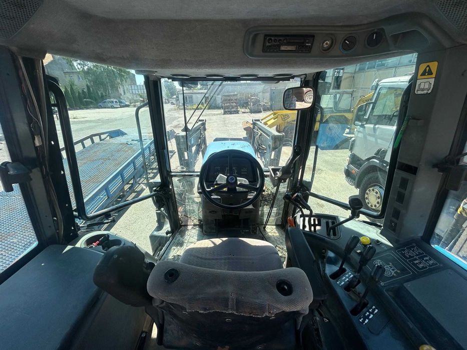 Ciągnik New Holland TM 130 z ładowarką czołową (TUR) - Import z Belgii