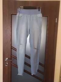 Jeansy dżinsy spodnie elastyczne z rozdarciami 42 XL