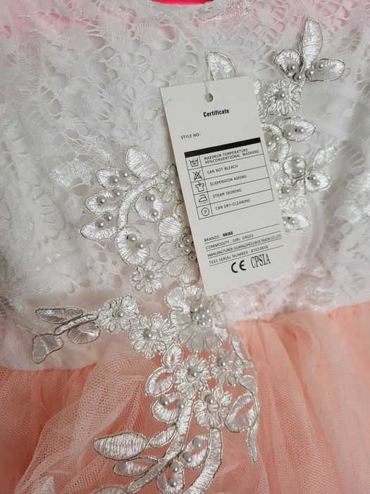 Elegancka sukienka bialo-brzoskwiniowa dla dziewczynki