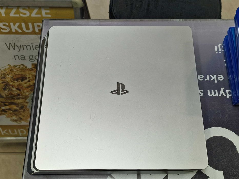 Playstation 4 Slim Silver 500GB/ 2 pady/ 10 gier/ Grade B/ GW 6msc/PS4