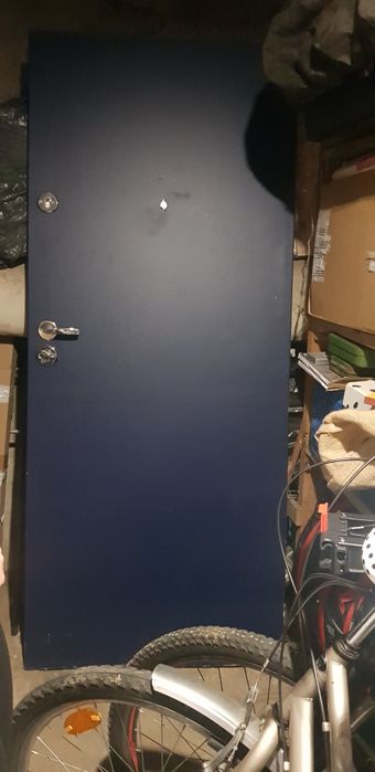 Drzwi wewnatrzklatkowe wejściowe z zamkami klamka kluczami