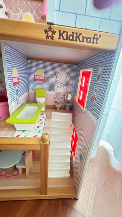 Casa de bonecas com acessórios