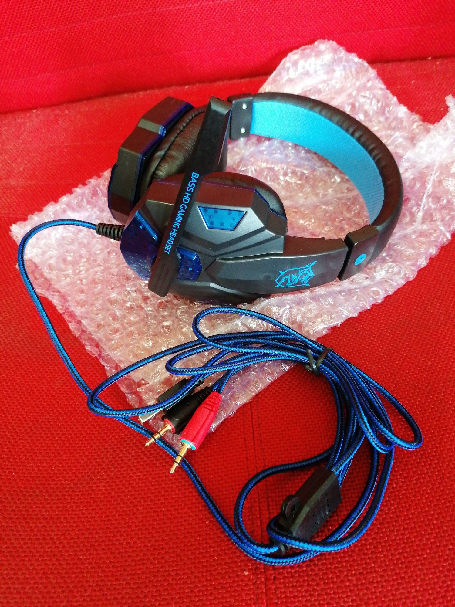 Auscultador Gaming com microfone preto/azul Novo com iluminação  azul